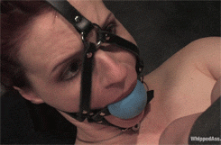 Gagged redhead knows she's gonna get punished