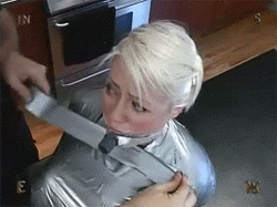 Blonde sub gets her body covered in duct tape
