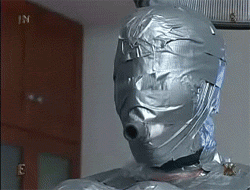 BDSM sub gets masked with duct tape 
